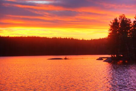 Sunrise on lakeの写真素材
