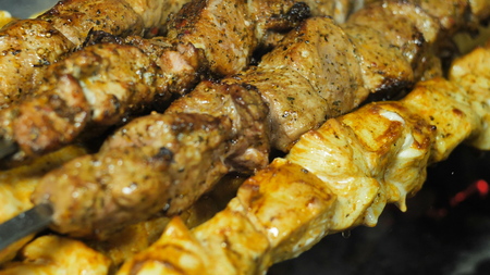 Close-up of white and red meat skewers, ready-made meat pieces strung on skewersの写真素材