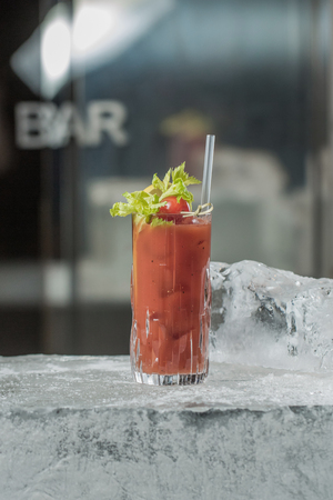 Homemade Bacon Spicy Vodka Bloody Mary with Tomatos, Olive and Celeryの写真素材