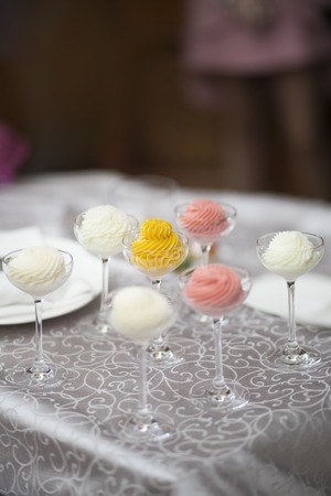 Many portions of ice cream in the bowls are colorful, top view. Restaurant Kitchen.の写真素材