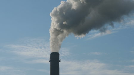 Chimney smoke background. Heating season, winter period, pipes ecologyの写真素材