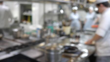 Blurred photo of the restaurant s kitchen, cooking process in the restaurant s kitchenの写真素材