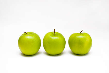 Three green apples. The Fruitの写真素材