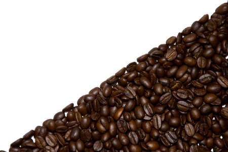 Equal pattern from coffee grains on a white backgroundの写真素材