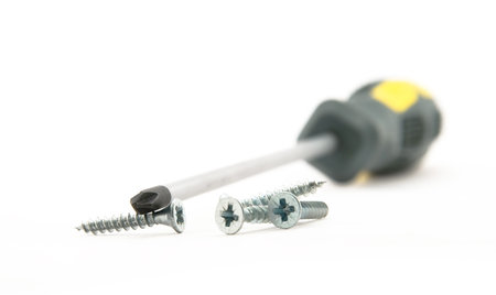 screwdriver with screws close-up view ** Note: Shallow depth of field
