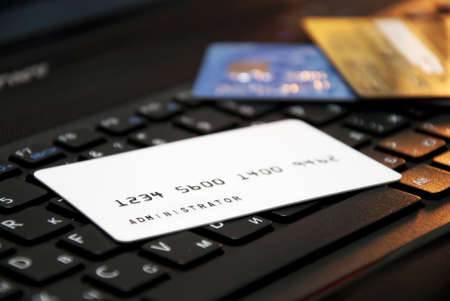 Plastic card with an inscription,Administrator on the computer keyboardの写真素材