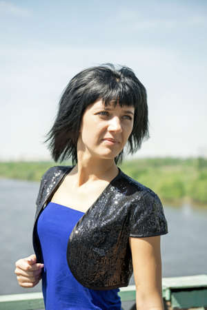 Young thoughtful female looks asideの写真素材