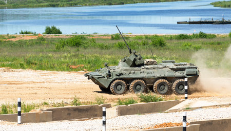 Armoured troop-carrier. The modern military equipment. Outdoor
