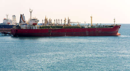 Old chemical tanker moored in the Port Novorossiyskのeditorial素材