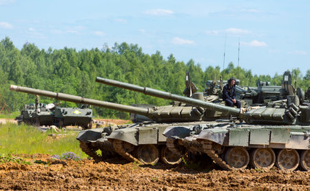 Alabino, Russia - 18 june, 2015: The tankman sits on the tank. International Military Forum ARMY...