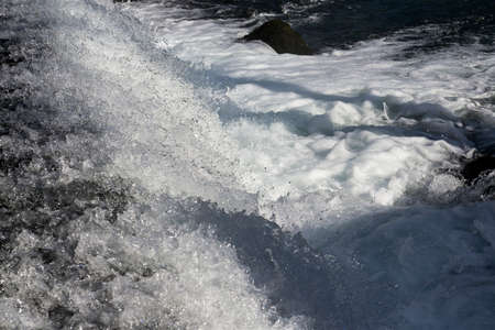 Close up Water flowing from the damの写真素材