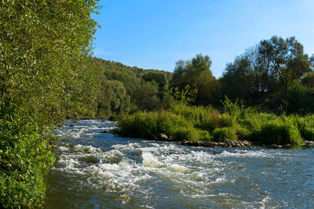 The Ilyushinskiy threshold for the rough river Osetr in moskow regionの写真素材