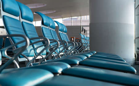 contemporary blue lounge with seats in the airportの写真素材