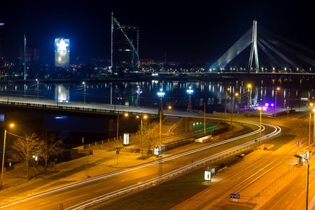 Night view of the bridge over the Daugava riverの写真素材