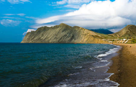 View of Cape Chameleon and the sea in Koktebel, Crimea. Beautiful summer background. Design of photo wallpapers, covers, screensavers.の写真素材