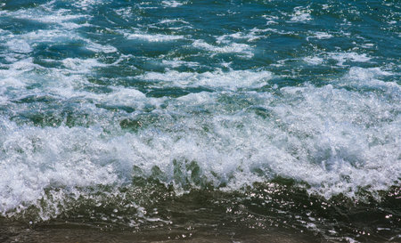 Autumn storm in Sochi. Big waves near the embankment. Stormy autumn black sea. Raging Black Sea. Big...