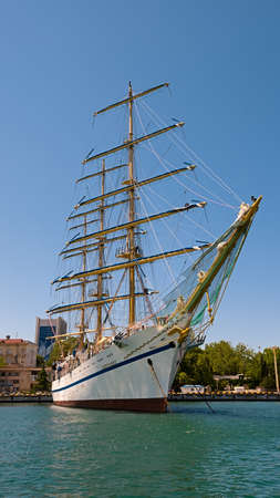 Sevastopol, Crimea, Russia - June 11, 2021: Three-masted training frigate Chersonesos. Mooring in the bay of Sevastopol.のeditorial素材