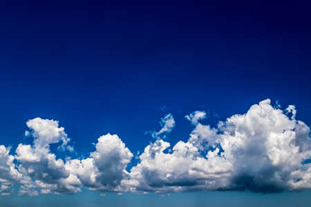 Blue sky background with clouds. cloudy backgroundの写真素材