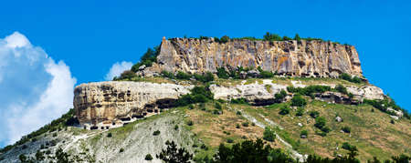 Ancient cave city on mount Tepe-Kermen in Crimea, Bakhchisarayの写真素材