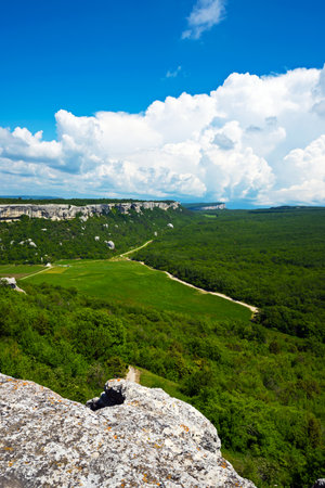 View to beautiful mountain landscape near the cave city Eski-Kermen, Crimeaの写真素材