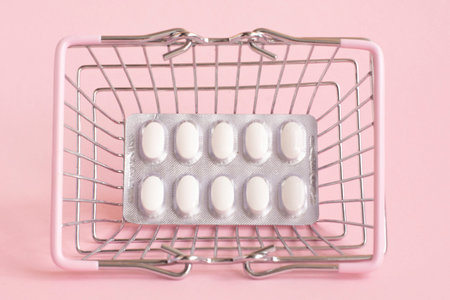 Shopping basket with medicinal pills.Pharmacy Shopping Concept. top view