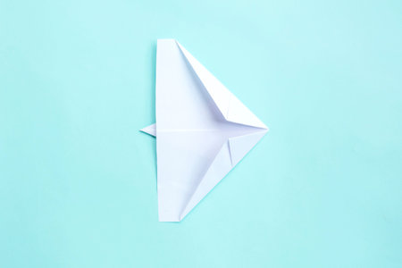assembly procedure of a paper white airplane. Origami. Creation.