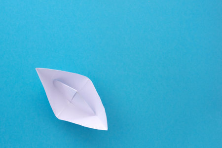 assembly procedure for a white paper ship. Origami. Creature.