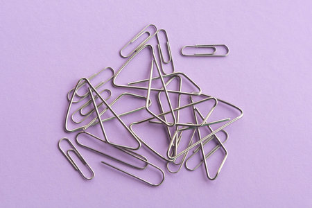 metal paper clips. The idea for the design of school notebooks.