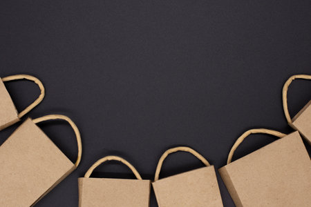 craft packages on a black background. creative idea for online shopping, sale, supermarket, discount promotion and black friday concept. Copy space for textの写真素材