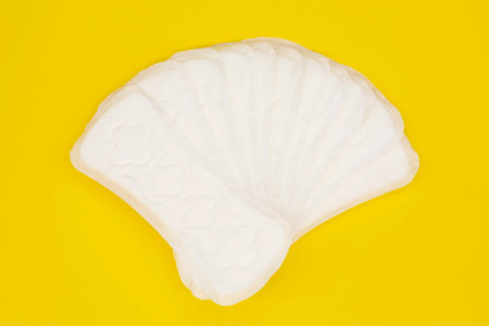napkin or sanitary pad for intimate hygiene on a yellow background