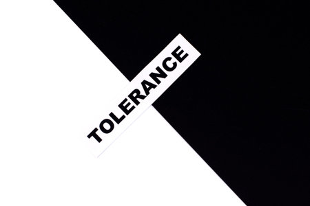 tolerance text on a white-black background. Equality, diversity and tolerance social concept.