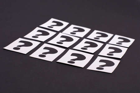 a question mark on a white sheet. FAQ frequency asked questions, Answer and Brainstorming Conceptsの写真素材