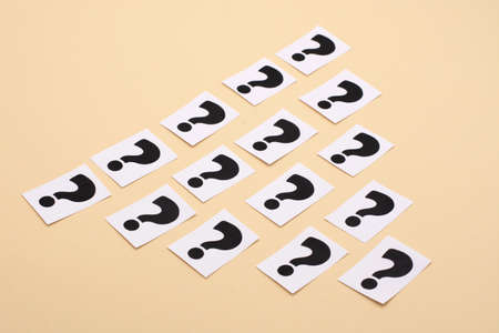 a question mark on a white sheet. FAQ frequency asked questions, Answer and Brainstorming Conceptsの写真素材