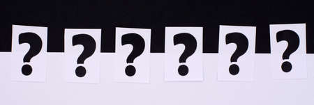a question mark on a white sheet. FAQ frequency asked questions, Answer and Brainstorming Conceptsの写真素材