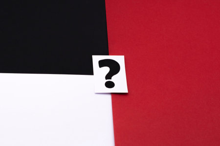 a question mark on a white sheet. FAQ frequency asked questions, Answer and Brainstorming Conceptsの写真素材