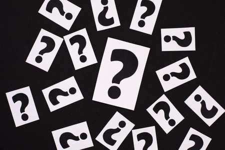 a question mark on a white sheet. FAQ frequency asked questions, Answer and Brainstorming Conceptsの写真素材