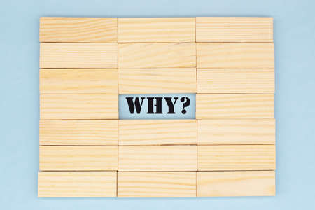 the word why among the wooden blocks. Answer search concept.の写真素材