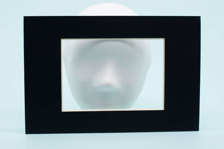 white Venetian mask on a blue background. The concept of the theater. Hypocrisy.の写真素材
