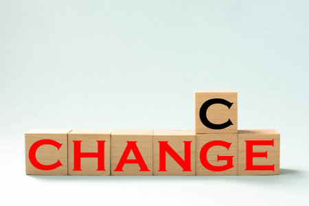 wooden cubes with the words CHANGE and CHANCE Success, strategy, solution and Positive thinking...