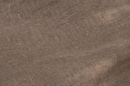 beige fabric texture packaging burlap, one hundred percent natural linenの写真素材