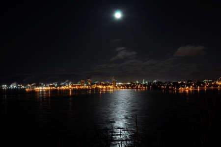 Lunar path leading to a vibrant cityの写真素材