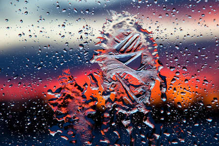 Drops of water with ice on glassの写真素材