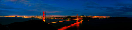 Night bridge over the river with bright lighting