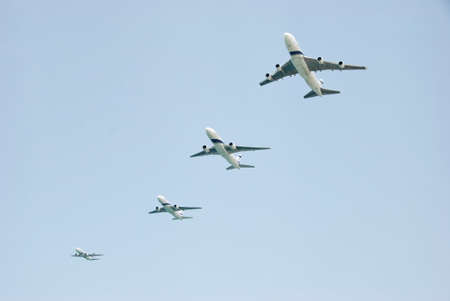 Four huge aircraft in the blue skyのeditorial素材