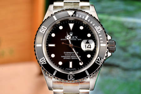 Rolex Submariner is the reference diving watch, model with date and steel strap.のeditorial素材