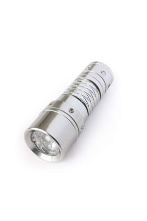 Flashlight metallic shining  cylindrical  on a white backgroundの写真素材