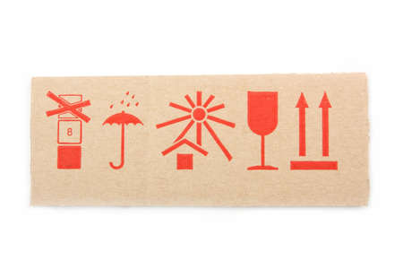 Piece carton with red warning signs on a white backgroundの写真素材