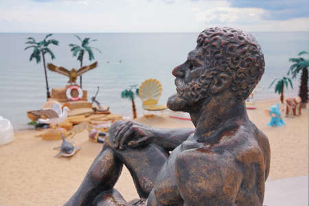 Crimea, sculpture "Resting Hercules" in Evpatoria on the beachの写真素材
