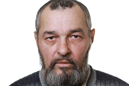 Real man with a beard looks at the camera on white backgroundの写真素材