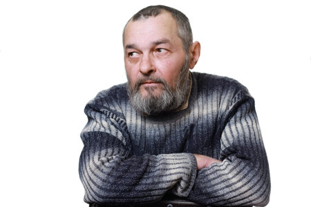 Real man with a beard on white background looking away
